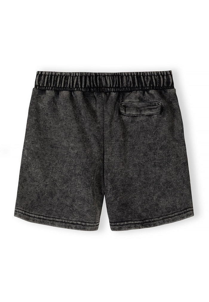 Back view of grey acid wash shorts with elasticated waistband and small pocket.